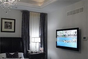 Как выбрать место для телевизора в спальне