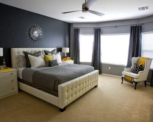 Стильный интерьер спальни с использование серого цвета