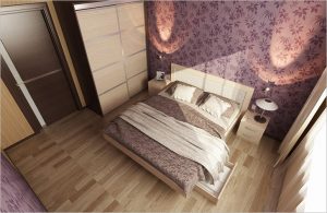 Светлый ламинат, уложенный в спальне